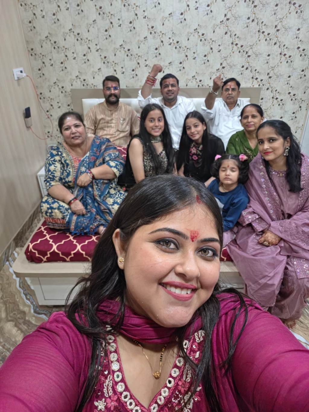Sisters Tie Rakhis on Brothers Wrists Praying for Happiness Prosperity and Longevity